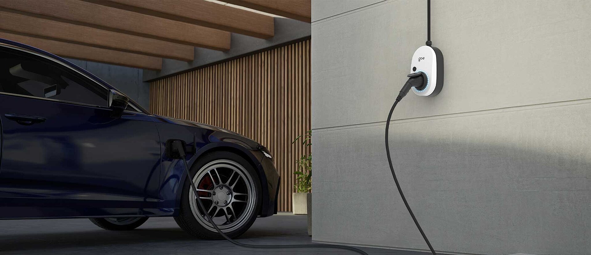 Wallbox go-e-chargergemini-2.0 11 kw next to electric vehicle