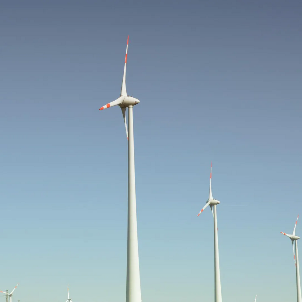 Wind mill farm power turbine producing renewable energy